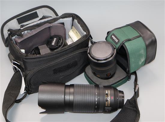 A Nikon F3 SLP with Nikkor 50mm 1: 1.4, a Nikkor 70-300mm 1:4.5 - 5.6G, Nikkor 50mm 1:1.8 D and a Sigma lens